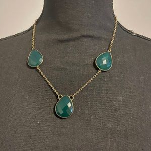 Gold and green necklaces